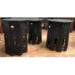 Two various octagonal occasional tables with Islamic geometric decoration, and another, possibly