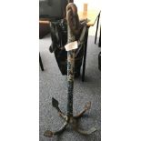 A blue-painted wrought iron four-hook marine anchor, 94cm high