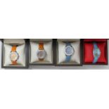 Four assorted ladies wristwatches comprising three Trias examples, each with coloured dials,