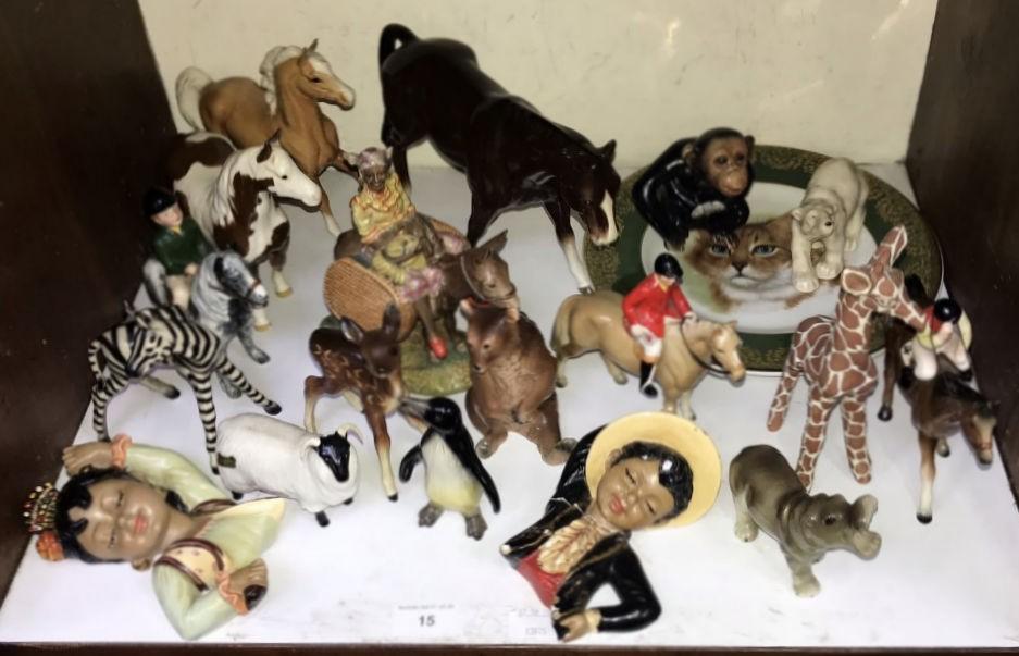 SECTION 15. A collection of assorted ceramic animals comprising horses, monkeys and bears etc.