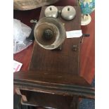 A Western Electric Co Model 317P Magneto oak cased wall phone, with working crank and bells,