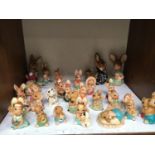 SECTIONS 5 & 6. A collection of approximately 43 assorted ceramic rabbits, predominantly Pendelfin