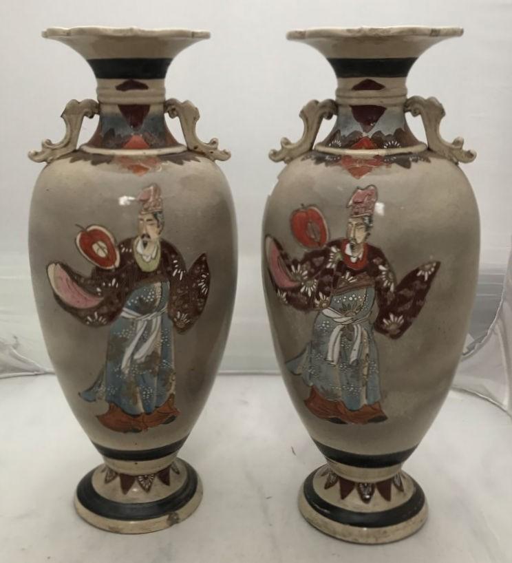 A pair of early 20th century large Japanese Satsuma vases, of baluster form, incised and painted