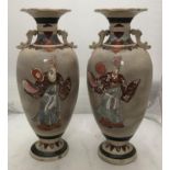 A pair of early 20th century large Japanese Satsuma vases, of baluster form, incised and painted