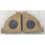 A pair of sandstone quadrant bookends with mounted Tudor Rose roundels 'This Stone is from The