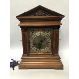 A large 19th century oak mantel clock by Winterhalder & Hofmeier, of classical form with