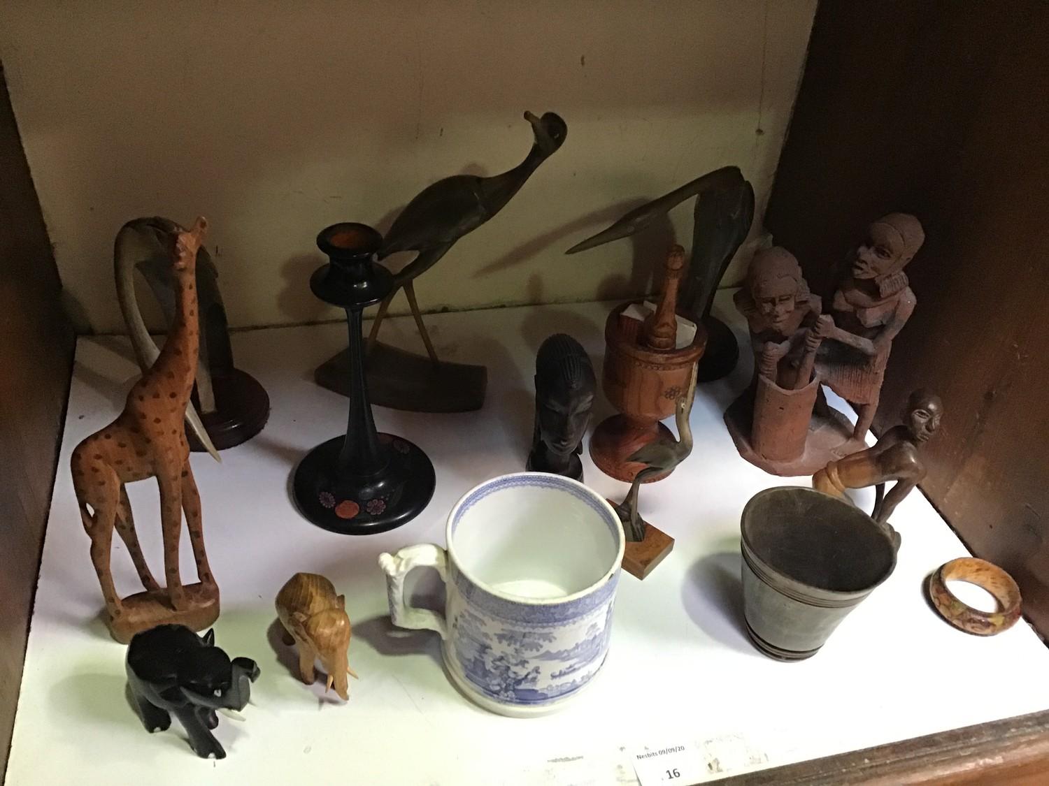 SECTION 16. An early 19th century pearlware mug with a romantic scene, together with various African