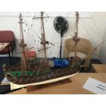 A hand-built painted wooden scale model of a fully-rigged 18th century 64-gun ship-of-the-line, on