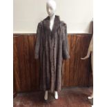 WITHDRAWN: Ladies full length vertical striped brown fur coat, no makers label and no size