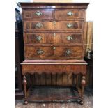 An 18th century and later bur-walnut veneered chest-on-stand in the William & Mary 'style,'