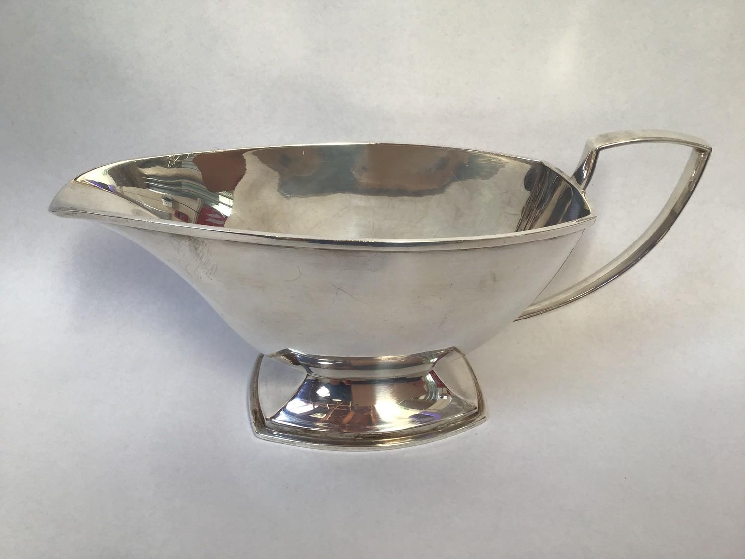 A silver sauce boat with angular mid section, shaped handle, hallmarked Sheffield, 1938, maker's - Image 2 of 3