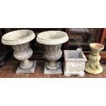 A pair of reconstituted stone garden planters of Italian Campagna form, 58cm high, together with two