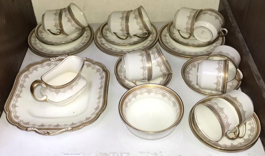 SECTION 19. An Edwardian 'Aynsley' cream part teat set with gilded decoration, 33 pieces