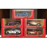 5 boxed Burago die cast scale 1:24 model cars including Bugatti Atlantic, Ford AC Cobra, BMW M3,