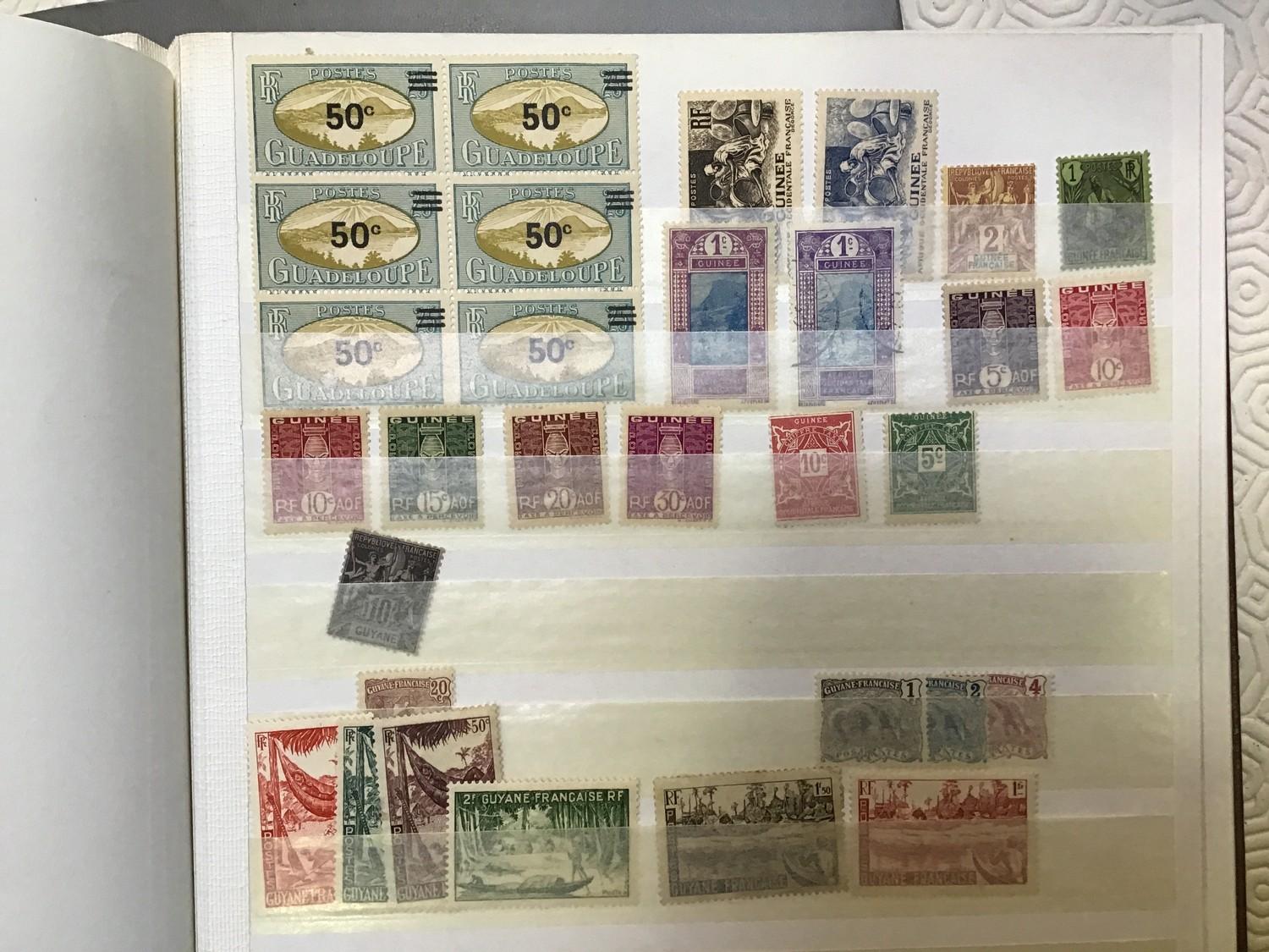 A collection of assorted used and unused world stamps across multiple albums, largely loose - Image 2 of 4