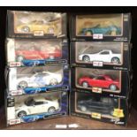 8 boxed die cast Maisto scale 1:24 model cars including 2009 Nissan GTR, 2010 Chevrolet Camaro SS