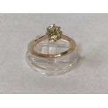 An 18ct gold solitaire diamond ring, eight-claw set with an oval old-cut diamond, M colour, P2