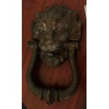 A heavy cast brass Lion's mask door knocker, 24cm