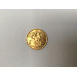A 1911 22ct gold half-sovereign, gross weight approximately 4g
