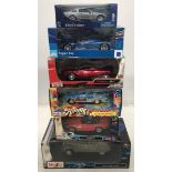 6 boxed die cast model cars including a Maisto Citroen 2CV (scale 1:18), Maisto BMW Z8 (scale 1:24),