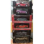 6 boxed die cast scale 1:18 model sports cars. 2 x Kid Connection Porsche Carrera GT & Land Rover