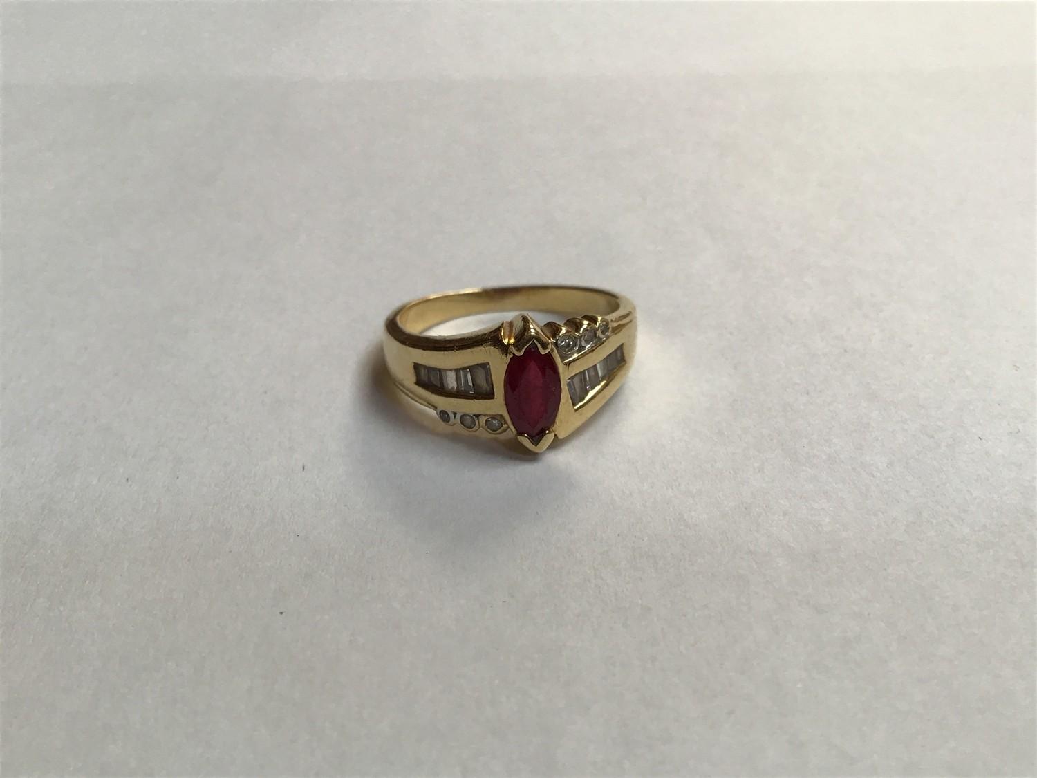 An 18ct gold ring, claw set with a marquise cut ruby, estimated weight of ruby 0.70cts, the