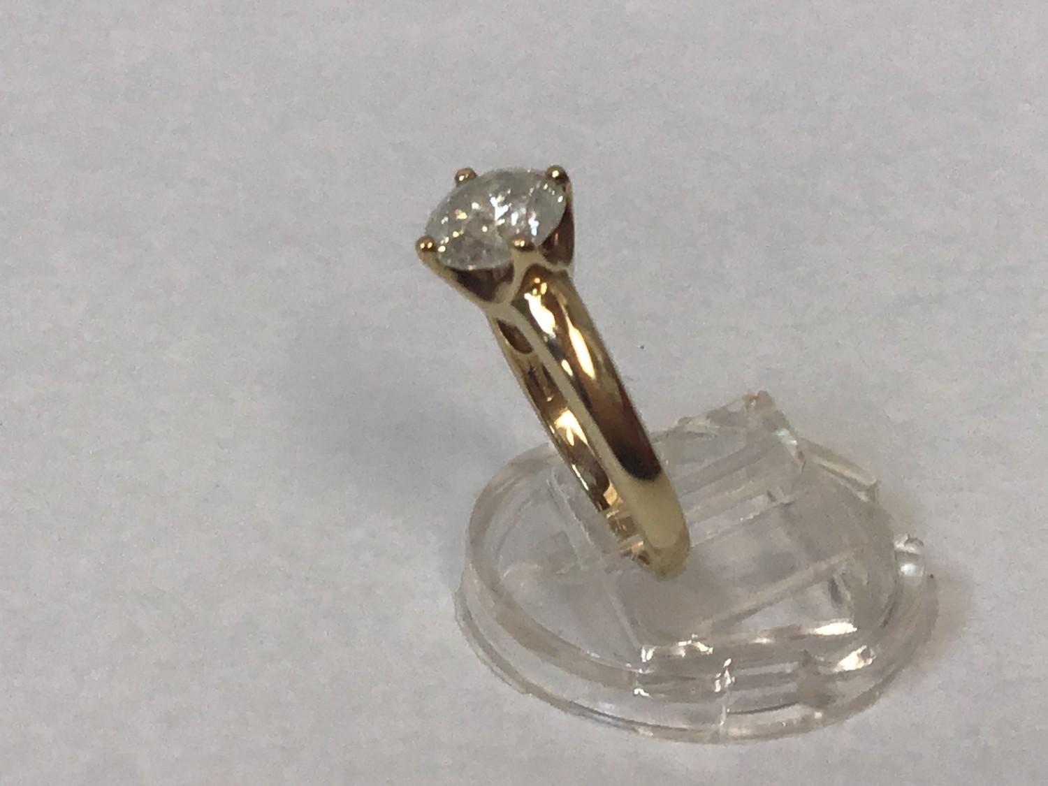 A 9ct gold solitaire diamond ring, four-claw set with a round brilliant-cut diamond, I colour, P3 - Image 2 of 2