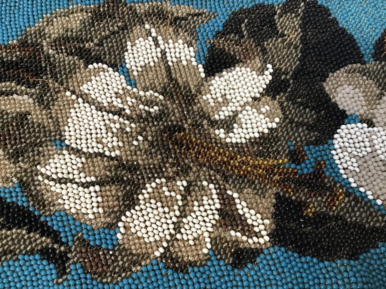 A heavy Victorian beadwork panel depicting scrolling lilies to a turquoise beaded ground, 130cm - Image 2 of 2