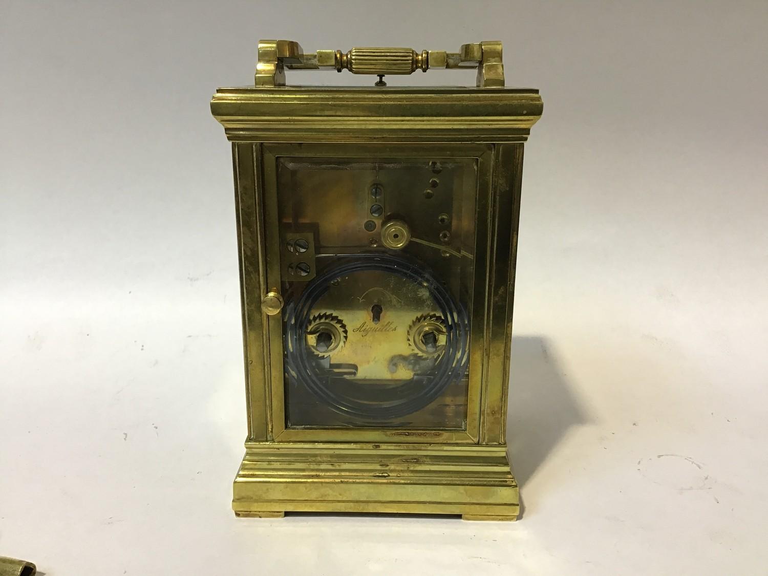 A gilt-brass repeater carriage clock, the gilt dial with Roman numerals denoting hours and - Image 3 of 4