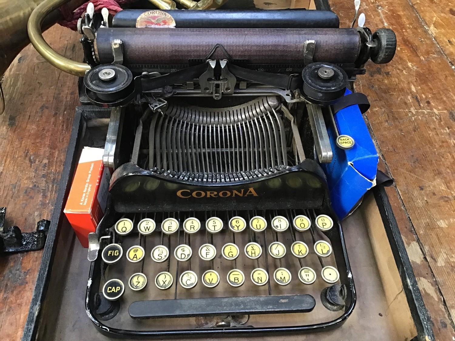 An early 20th century Corona folding typewriter, together with a brass horn by F Besson, Euston Road - Image 2 of 2