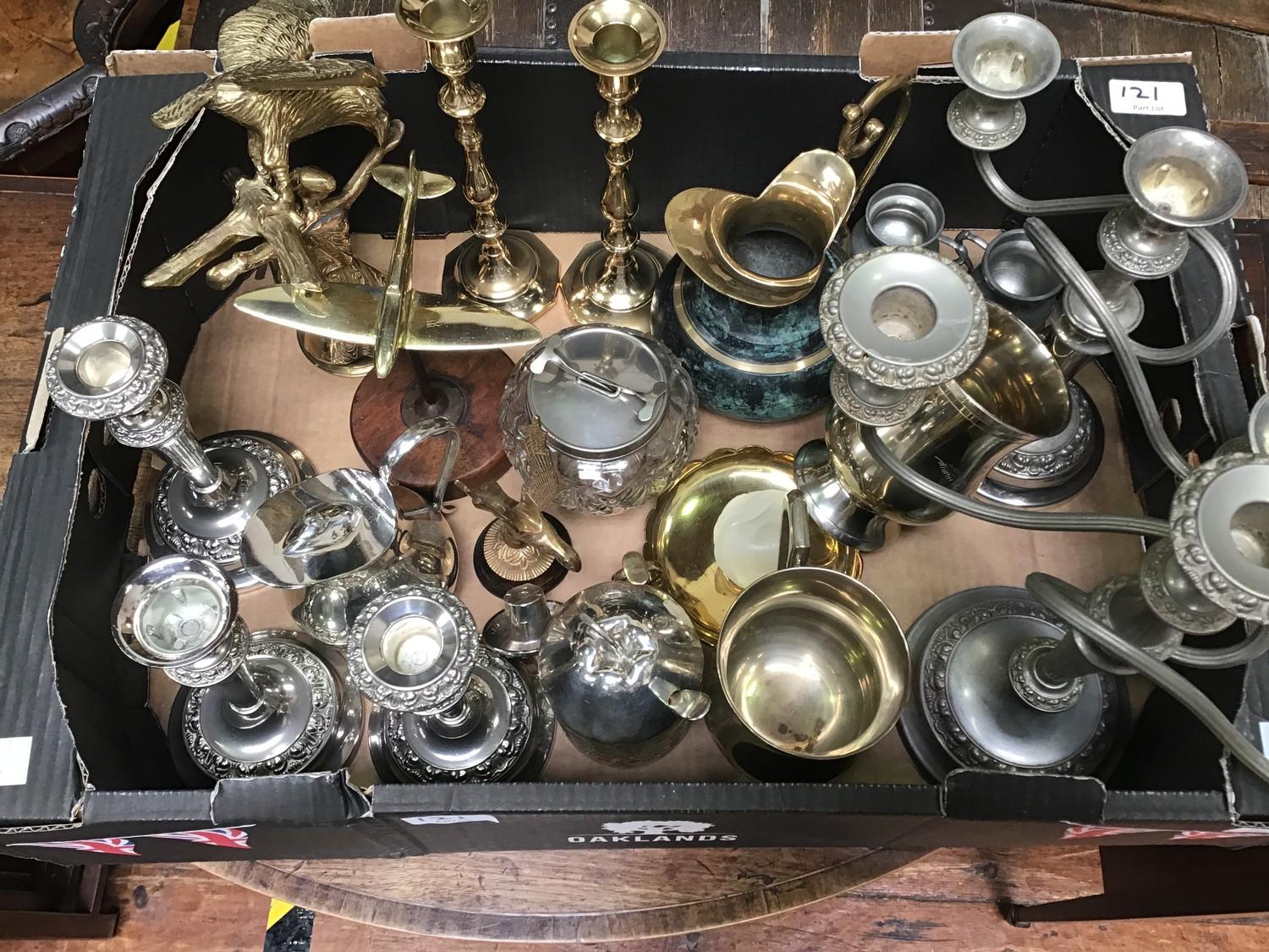 A quantity of assorted silver-plate, pewter and metalware items comprising a pair of three light