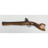 A 19th century flintlock blunderbuss of Middle Eastern origin, 11.25' inch flared barrel with acid