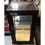 A stained oak framed and glazed table-top display cabinet, by J.C. King, Shop Fitters,
