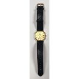 A 1970's 18ct gold cased Longines quartz wristwatch, the gilt dial with Roman numerals denoting