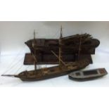A well-detailed wooden waterline model of a 19th century fully-rigged three-mast 'Tea Clipper,' 64cm