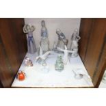 SECTION 22. Various Lladro and Spanish porcelain figurines including 'Lladro Christmas Tree' from