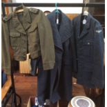 A 1944 British Lieutenant battle dress tunic, together with a WW2 RAF tunic and a 1961 RAF overcoat