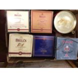 Six assorted unopened commemorative Bell's Extra Special, Old Scotch Whisky ceramic decanters,