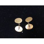 A pair of 9ct gold cufflinks, with oval un-engraved faces, chain linked, 7.8g