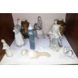 SECTION 15. Six Lladro porcelain figures including girl with turkey, girl with lamb, seated
