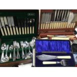 Two various silver-plated part canteens of cutlery, together with five boxed sets of flatware