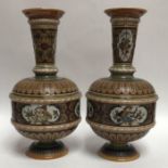 A pair of Villeroy and Boch Mettlach pottery vases, in the Renaissance style, the body of compressed