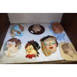 SECTION 8. Seven various art deco 'style' pottery wall masks including a West German Cortendorf
