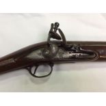 A Flintlock Coaching Carbine, with 16.5' inch steel barrel, lock engraved with Crowned 'GR,' brass