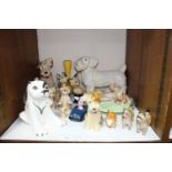 SECTION 21. A mixed lot of ceramics including Sylvac dogs, rabbit wheel and vase Beswick dogs,