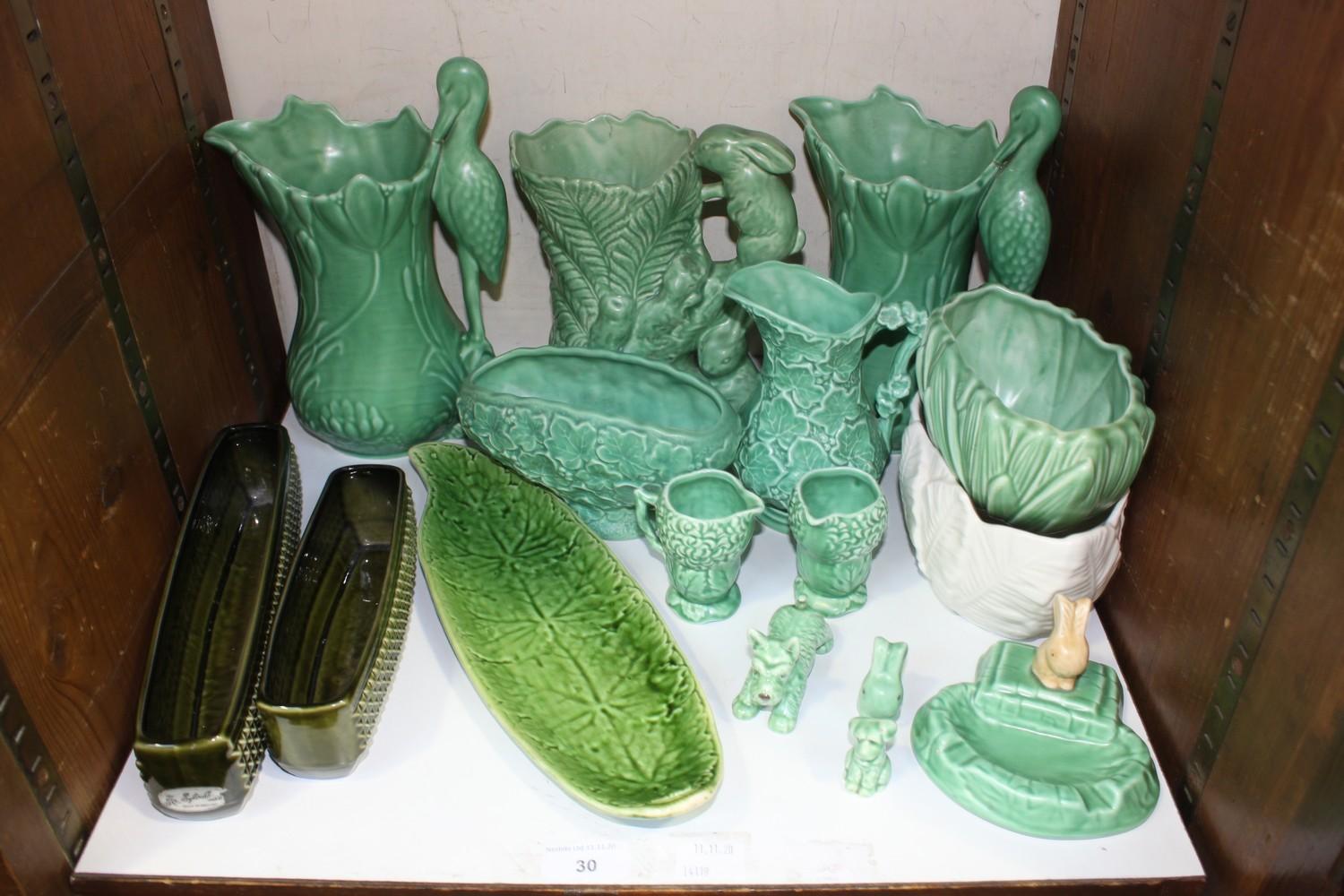 SECTION 30. A large quantity of Sylvac including green glazed stork jugs, small jugs, bowls and