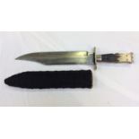 A 19th century Bowie Knife with 11-inch blade by Alexander of Sheffield and two-piece shaped cow-