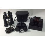 Four pairs of assorted binoculars including Barr & Stroud CF41, Mark Scheffel 20 x 50, Carl Zeiss