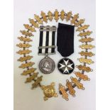 A 1945 Service Medal of The Order of St. John, named to 30655 D/Supt R.E. Cooper, together with St
