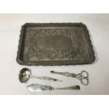 An Edwardian silver dressing table tray, Birmingham, 1902, maker's mark of Minshull & Latimer, a